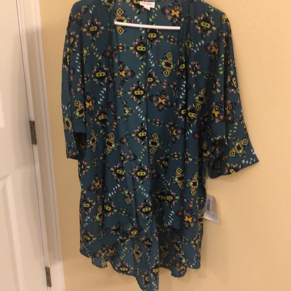 Short kimono style cardigan.